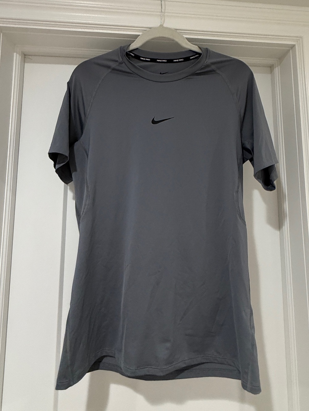 Nike Gray Short Sleeve Athletic Tee with Black Swoosh